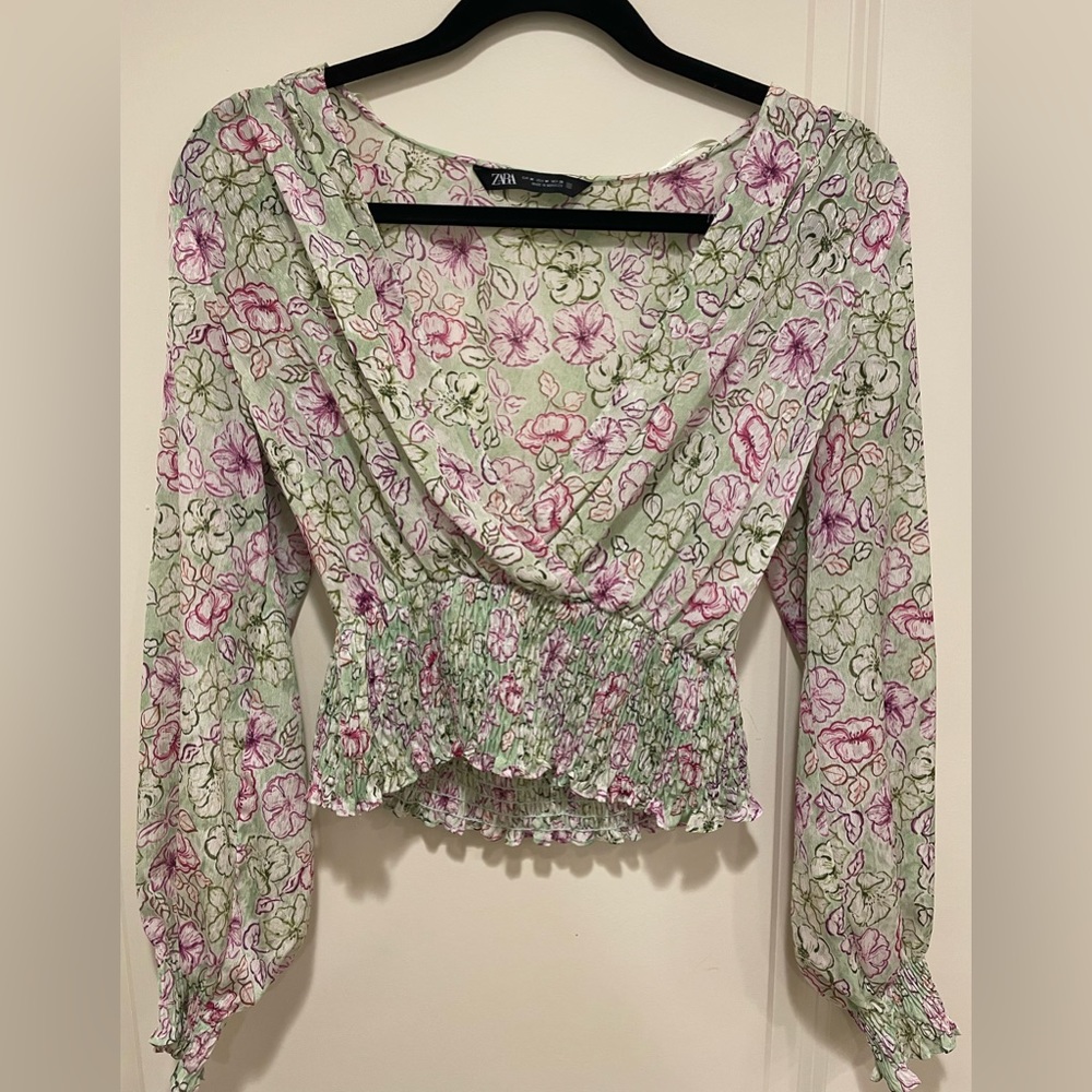 Zara floral blouse, front cut/cross, Size M , falls at waist length.